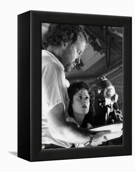 Alien, 1979 directed by Ridley Scott On the set, Ridley Scott directs Sigourney Weaver (photo)-null-Framed Stretched Canvas