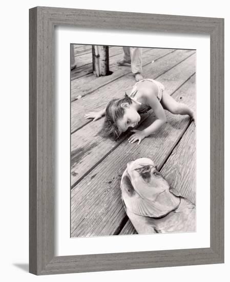 Allen Cook's Daughter Looking at the Open Mouth of a Just Caught, Giant Fish-Alfred Eisenstaedt-Framed Photographic Print