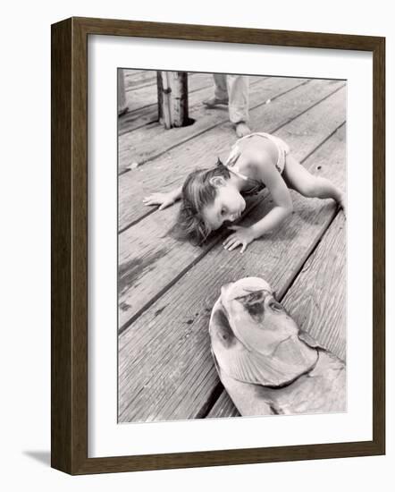 Allen Cook's Daughter Looking at the Open Mouth of a Just Caught, Giant Fish-Alfred Eisenstaedt-Framed Photographic Print