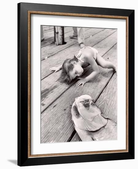 Allen Cook's Daughter Looking at the Open Mouth of a Just Caught, Giant Fish-Alfred Eisenstaedt-Framed Photographic Print