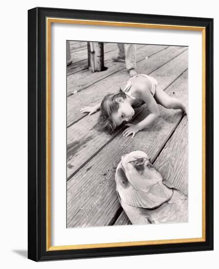 Allen Cook's Daughter Looking at the Open Mouth of a Just Caught, Giant Fish-Alfred Eisenstaedt-Framed Photographic Print