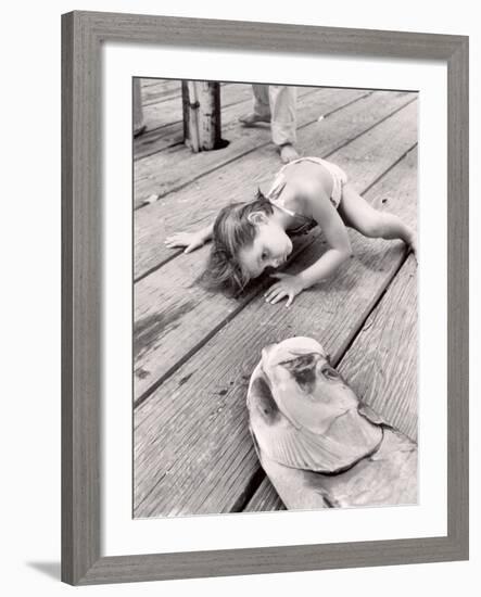 Allen Cook's Daughter Looking at the Open Mouth of a Just Caught, Giant Fish-Alfred Eisenstaedt-Framed Photographic Print