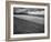 Along British Coastline, Woman Walking on Pebbled Shore-Nat Farbman-Framed Photographic Print