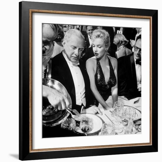 Ambassador Winthrop Aldrich, Ex Envoy to Britain Chatting with Actress Marilyn Monroe-Peter Stackpole-Framed Premium Photographic Print