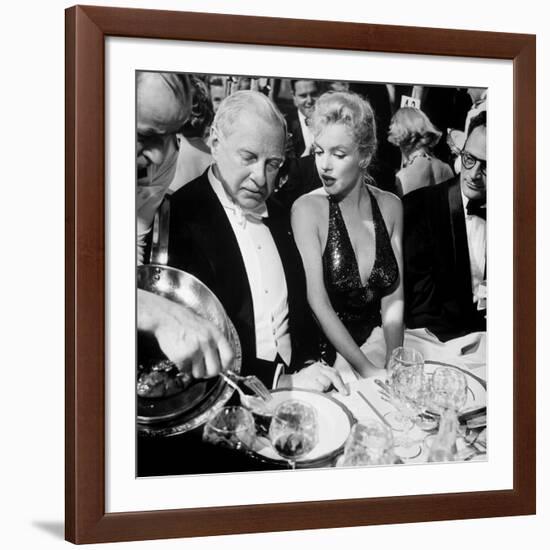 Ambassador Winthrop Aldrich, Ex Envoy to Britain Chatting with Actress Marilyn Monroe-Peter Stackpole-Framed Premium Photographic Print