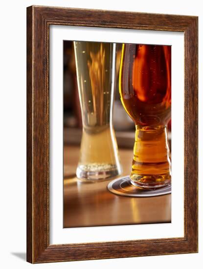 Amber Ale And Lager Style Beer Next To Each Other At A Bar-Shea Evans-Framed Photographic Print