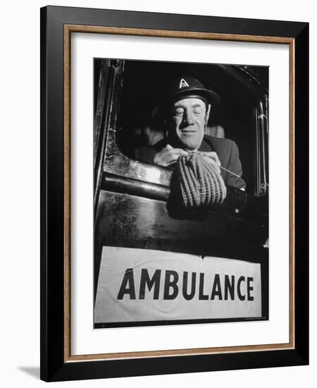 Ambulance Driver Knitting For the English Army During WWII-Carl Mydans-Framed Photographic Print