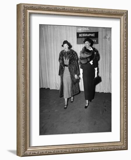 Amelia Earhart arrives with Eleanor Roosevelt to address the National Geographic Society, 1935-Harris & Ewing-Framed Photographic Print