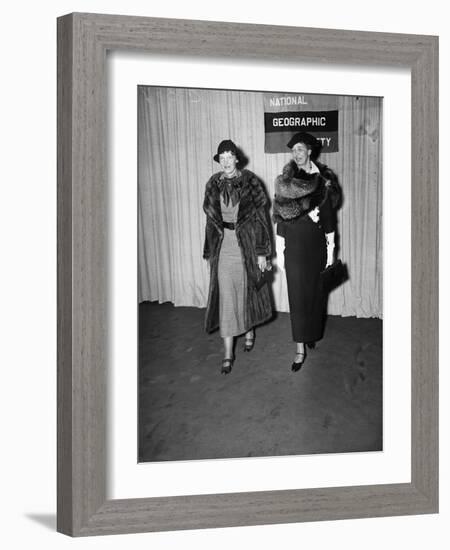 Amelia Earhart arrives with Eleanor Roosevelt to address the National Geographic Society, 1935-Harris & Ewing-Framed Photographic Print