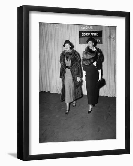 Amelia Earhart arrives with Eleanor Roosevelt to address the National Geographic Society, 1935-Harris & Ewing-Framed Photographic Print