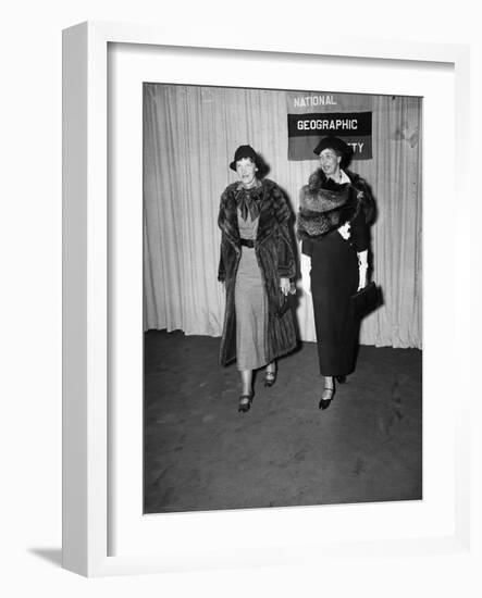 Amelia Earhart arrives with Eleanor Roosevelt to address the National Geographic Society, 1935-Harris & Ewing-Framed Photographic Print