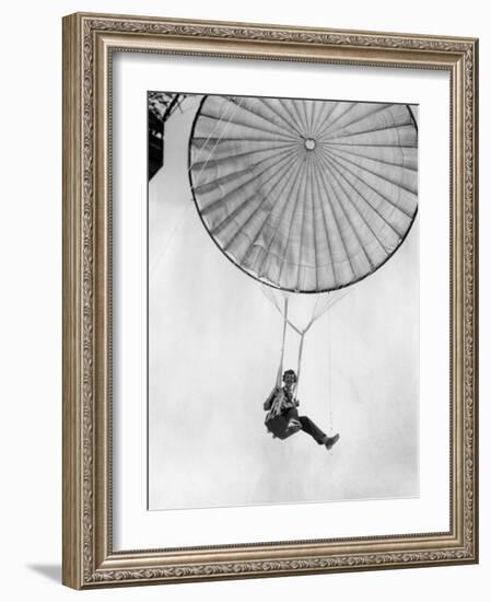 Amelia Earhart Helps Test a Commercial Parachute. June 2, 1935-null-Framed Photo