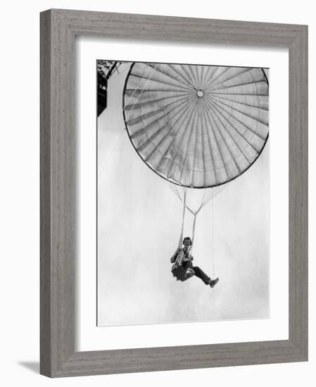 Amelia Earhart Helps Test a Commercial Parachute. June 2, 1935-null-Framed Photo