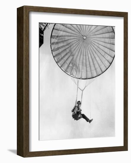 Amelia Earhart Helps Test a Commercial Parachute. June 2, 1935-null-Framed Photo