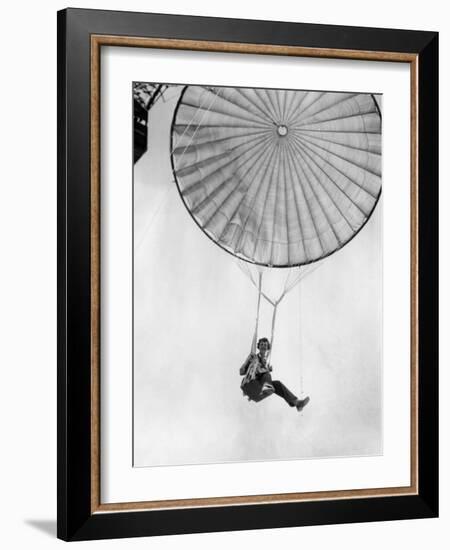 Amelia Earhart Helps Test a Commercial Parachute. June 2, 1935-null-Framed Photo