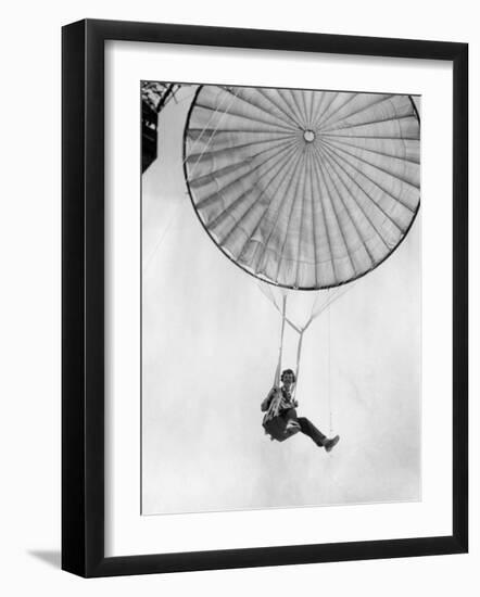 Amelia Earhart Helps Test a Commercial Parachute. June 2, 1935-null-Framed Photo