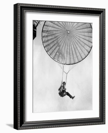 Amelia Earhart Helps Test a Commercial Parachute. June 2, 1935-null-Framed Photo