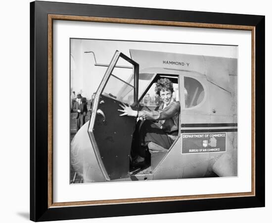 Amelia Earhart in an aeroplane, 1936-Harris & Ewing-Framed Photographic Print