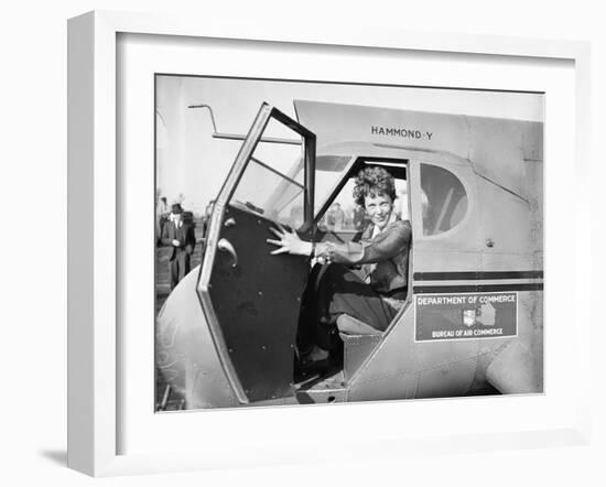 Amelia Earhart in an aeroplane, 1936-Harris & Ewing-Framed Photographic Print