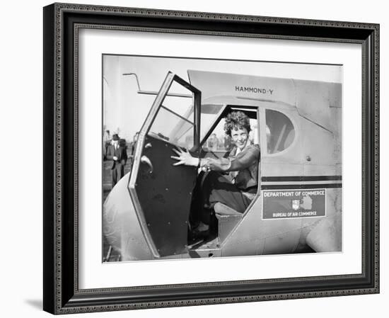 Amelia Earhart in an aeroplane, 1936-Harris & Ewing-Framed Photographic Print