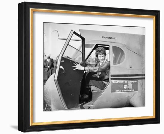 Amelia Earhart in an aeroplane, 1936-Harris & Ewing-Framed Photographic Print