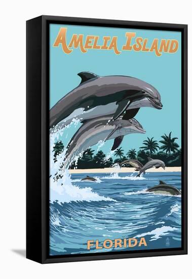 Amelia Island, Florida - Dolphins Jumping-Lantern Press-Framed Stretched Canvas