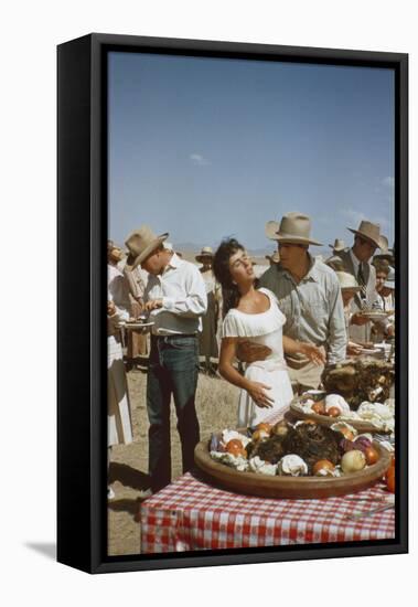 American Actor Rock Hudson Holds Actress Elizabeth Taylor While Filming 'Giant', Marfa, Texas, 1956-Allan Grant-Framed Premier Image Canvas