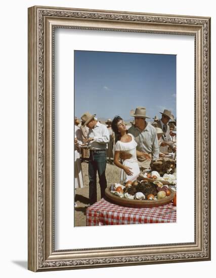 American Actor Rock Hudson Holds Actress Elizabeth Taylor While Filming 'Giant', Marfa, Texas, 1956-Allan Grant-Framed Photographic Print