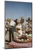 American Actor Rock Hudson Holds Actress Elizabeth Taylor While Filming 'Giant', Marfa, Texas, 1956-Allan Grant-Mounted Photographic Print