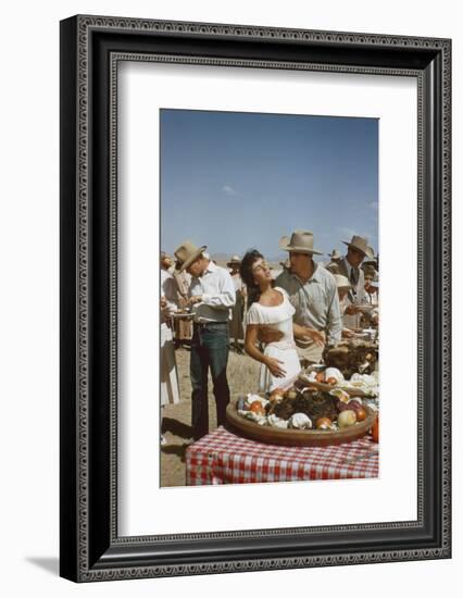 American Actor Rock Hudson Holds Actress Elizabeth Taylor While Filming 'Giant', Marfa, Texas, 1956-Allan Grant-Framed Photographic Print