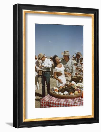 American Actor Rock Hudson Holds Actress Elizabeth Taylor While Filming 'Giant', Marfa, Texas, 1956-Allan Grant-Framed Photographic Print