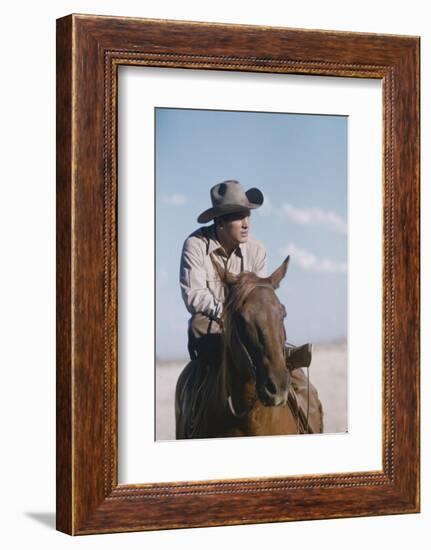 American Actor Rock Hudson on a Horse During the Filming of 'Giant', Near Marfa, Texas, 1955-Allan Grant-Framed Photographic Print