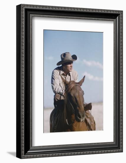 American Actor Rock Hudson on a Horse During the Filming of 'Giant', Near Marfa, Texas, 1955-Allan Grant-Framed Photographic Print