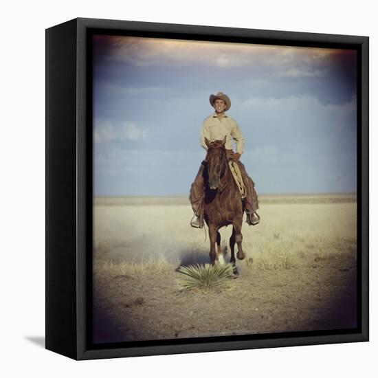 American Actor Rock Hudson Riding a Horse During Filming of 'Giant', Near Marfa, Texas, 1955-Allan Grant-Framed Premier Image Canvas