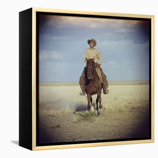 American Actor Rock Hudson Riding a Horse During Filming of 'Giant', Near Marfa, Texas, 1955-Allan Grant-Framed Premier Image Canvas