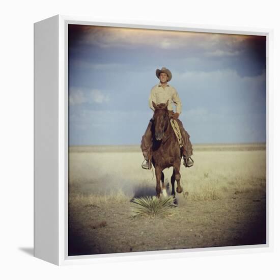 American Actor Rock Hudson Riding a Horse During Filming of 'Giant', Near Marfa, Texas, 1955-Allan Grant-Framed Premier Image Canvas