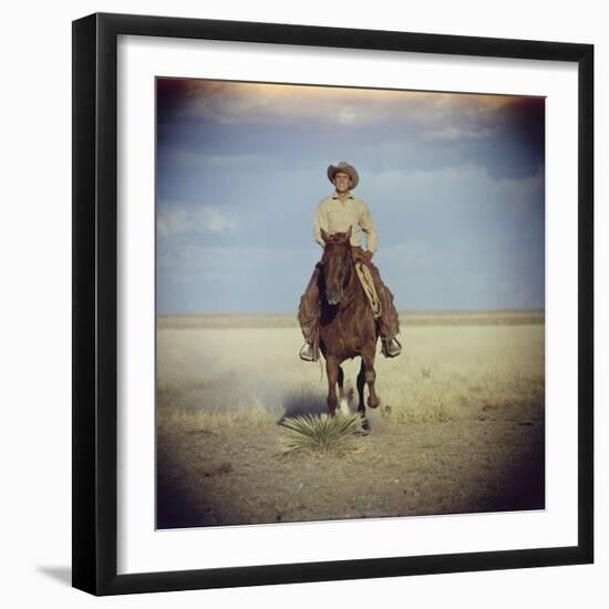 American Actor Rock Hudson Riding a Horse During Filming of 'Giant', Near Marfa, Texas, 1955-Allan Grant-Framed Photographic Print