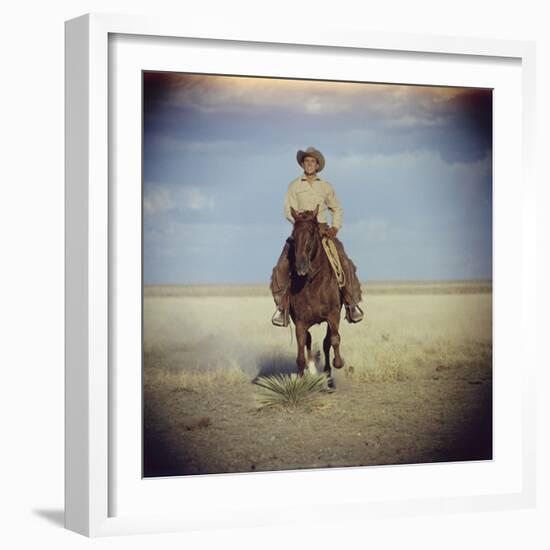 American Actor Rock Hudson Riding a Horse During Filming of 'Giant', Near Marfa, Texas, 1955-Allan Grant-Framed Photographic Print