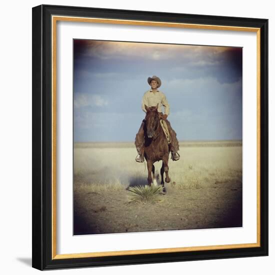 American Actor Rock Hudson Riding a Horse During Filming of 'Giant', Near Marfa, Texas, 1955-Allan Grant-Framed Photographic Print