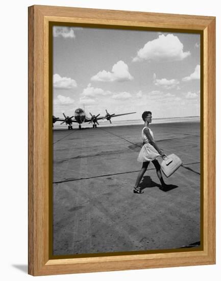 American Airline Hostess Crossing Field on Way to Jobs as a Model and Sales Clerk at Neiman Marcus-Lisa Larsen-Framed Premier Image Canvas