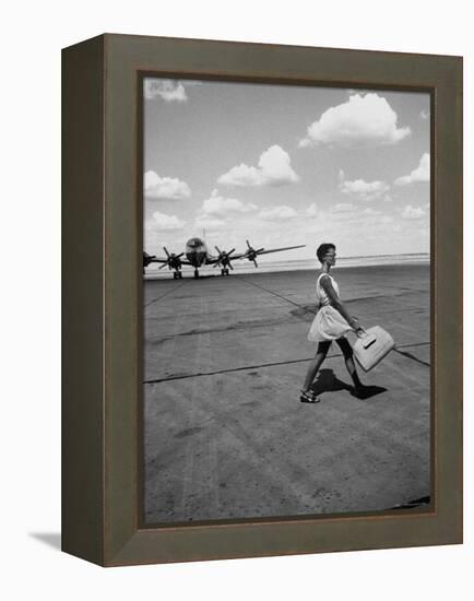 American Airline Hostess Crossing Field on Way to Jobs as a Model and Sales Clerk at Neiman Marcus-Lisa Larsen-Framed Premier Image Canvas