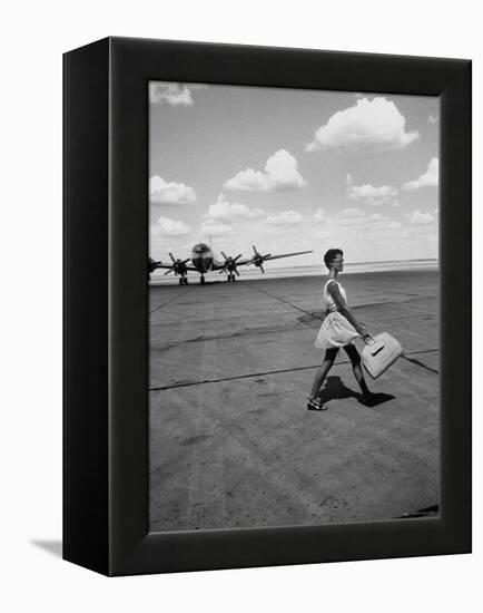 American Airline Hostess Crossing Field on Way to Jobs as a Model and Sales Clerk at Neiman Marcus-Lisa Larsen-Framed Premier Image Canvas