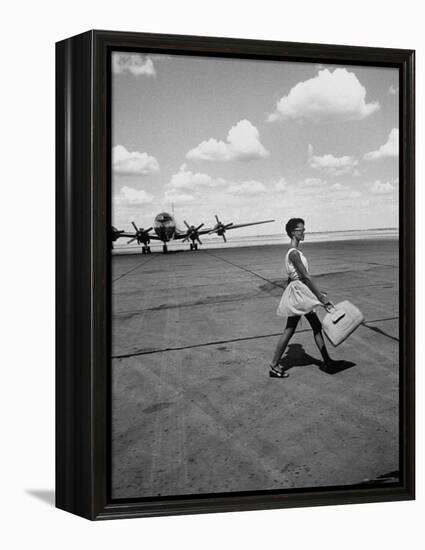 American Airline Hostess Crossing Field on Way to Jobs as a Model and Sales Clerk at Neiman Marcus-Lisa Larsen-Framed Premier Image Canvas