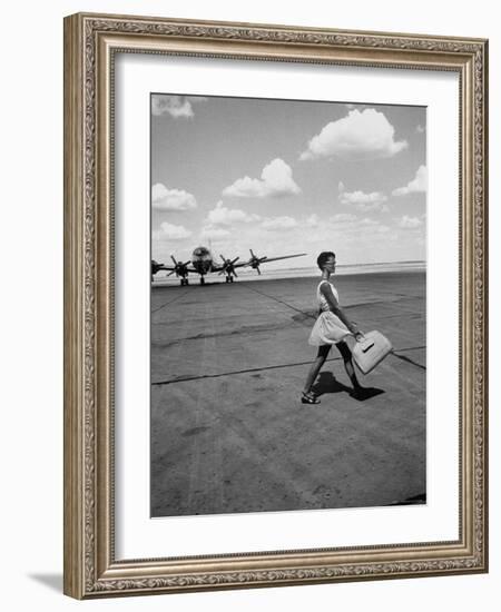 American Airline Hostess Crossing Field on Way to Jobs as a Model and Sales Clerk at Neiman Marcus-Lisa Larsen-Framed Photographic Print