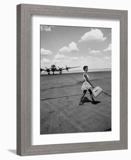 American Airline Hostess Crossing Field on Way to Jobs as a Model and Sales Clerk at Neiman Marcus-Lisa Larsen-Framed Photographic Print