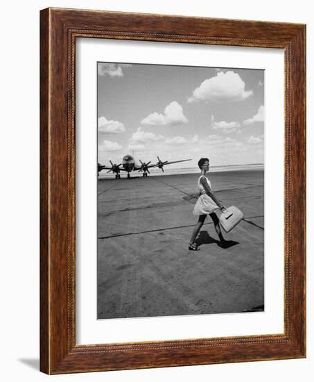 American Airline Hostess Crossing Field on Way to Jobs as a Model and Sales Clerk at Neiman Marcus-Lisa Larsen-Framed Photographic Print