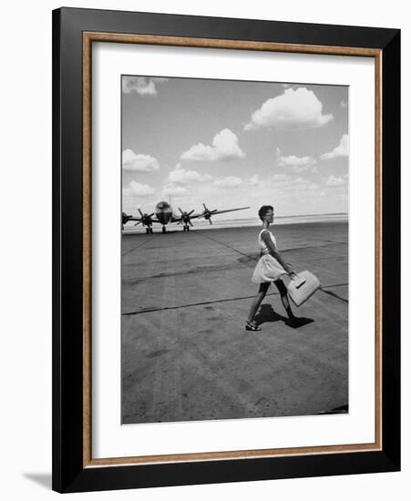 American Airline Hostess Crossing Field on Way to Jobs as a Model and Sales Clerk at Neiman Marcus-Lisa Larsen-Framed Photographic Print