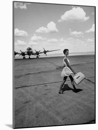 American Airline Hostess Crossing Field on Way to Jobs as a Model and Sales Clerk at Neiman Marcus-Lisa Larsen-Mounted Photographic Print