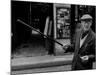 American Author Henry Miller Walking Along the Street-Carlo Bavagnoli-Mounted Premium Photographic Print