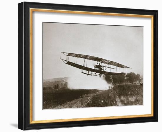 American aviator Glenn Curtiss making the first heavier-than-air flight in his 'June Bug', 1908-Edwin Levick-Framed Photographic Print